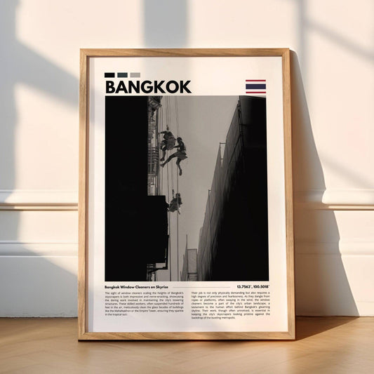 Window cleaners on a tall building in Bangkok captured in dramatic black and white photography, highlighting the sleek lines of the skyscraper and the courage of the workers.