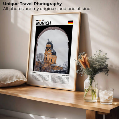 Snowy day in Munich with a traditional church covered in snow, creating a peaceful winter landscape in this photography poster, perfect for modern interiors or winter-themed decor.